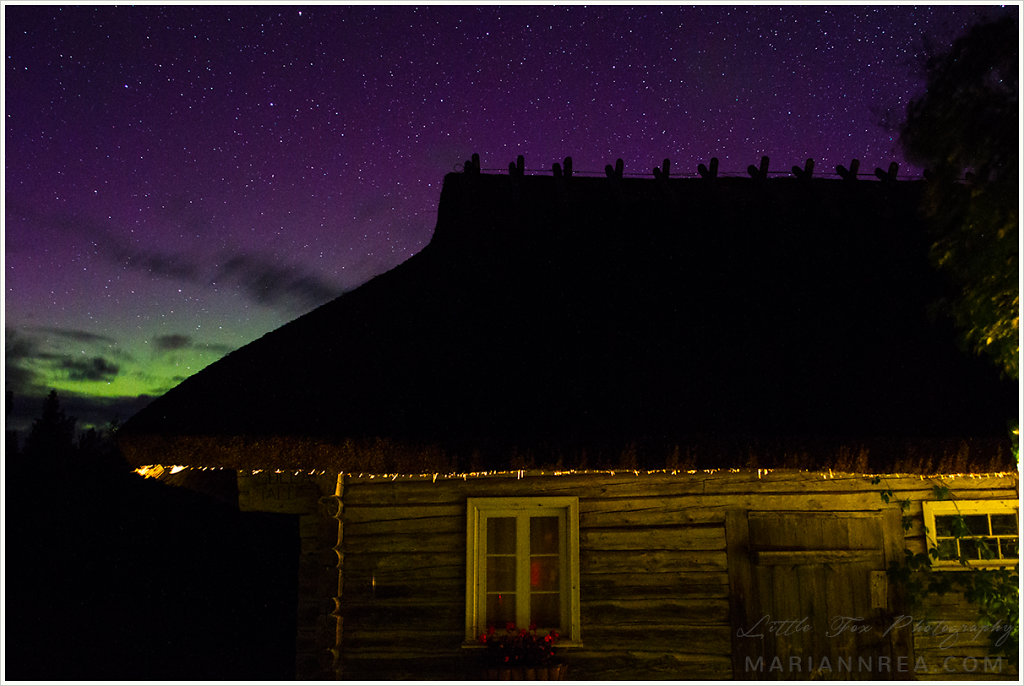 Cottage under the aurora borealis